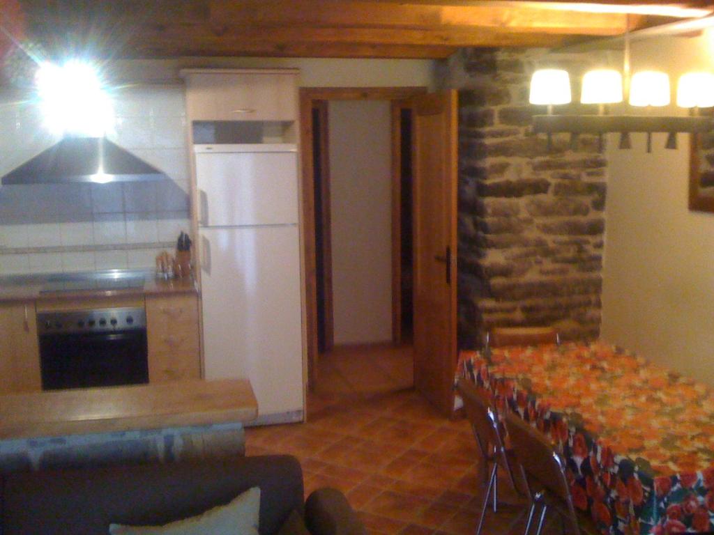 Kuchyň nebo kuchyňský kout v ubytování Roch Hotel