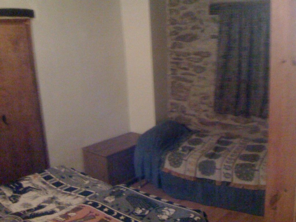 Postel nebo postele na pokoji v ubytování Roch Hotel