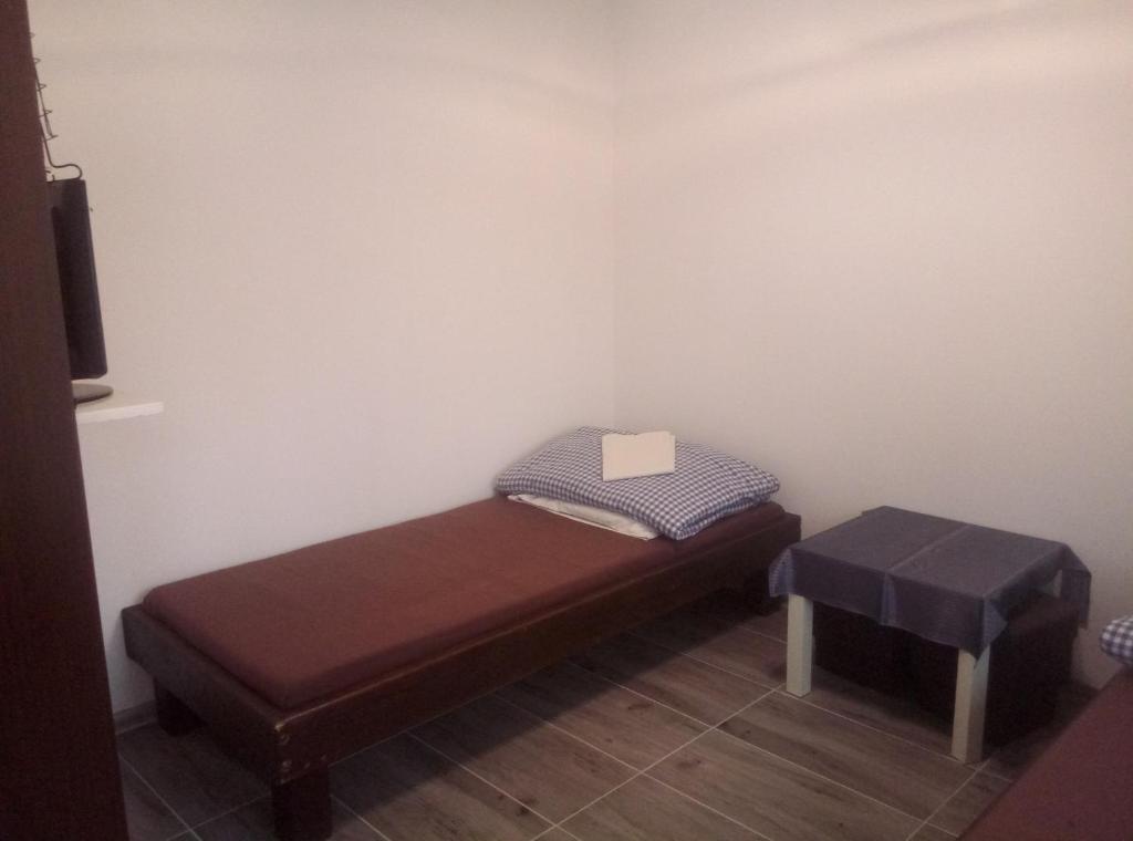 Postel nebo postele na pokoji v ubytování Zakątek Turysty