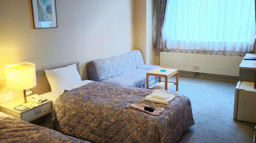 Postel nebo postele na pokoji v ubytování Mount View Hotel