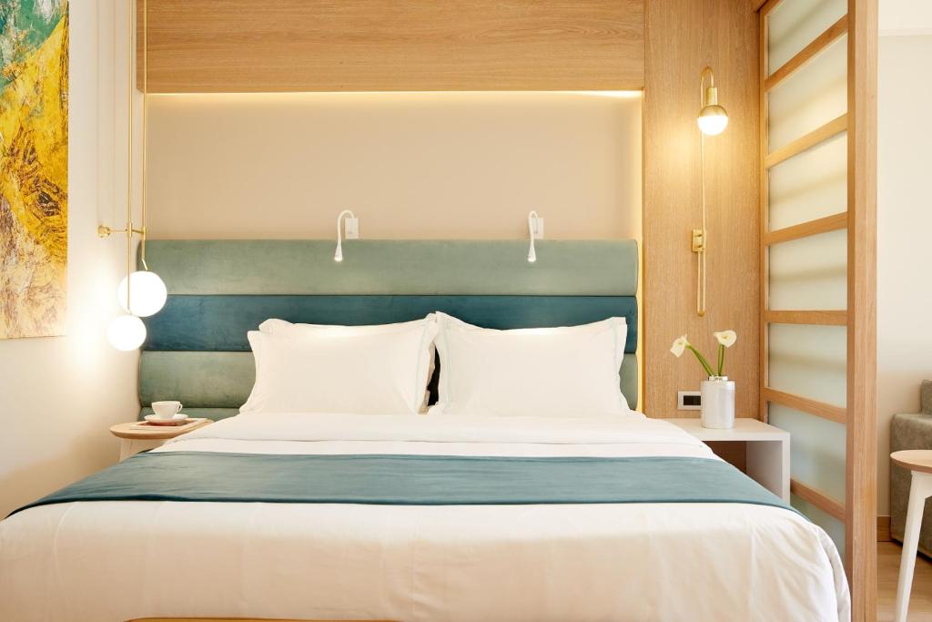 Postel nebo postele na pokoji v ubytování Anthemus Sea Beach Hotel and Spa