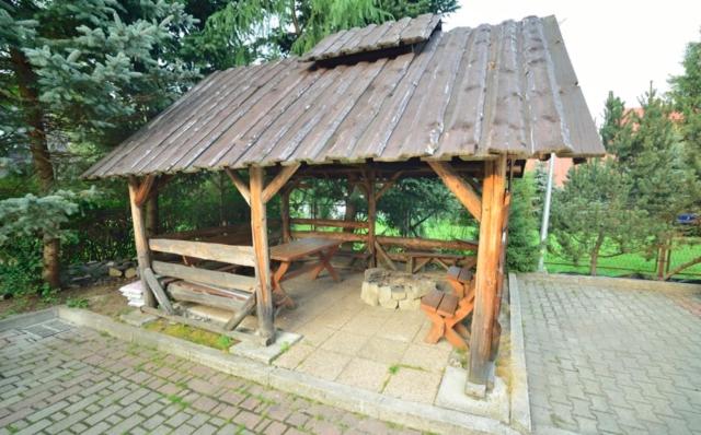 Vonkajšia záhrada v ubytovaní Apartament Regionalny