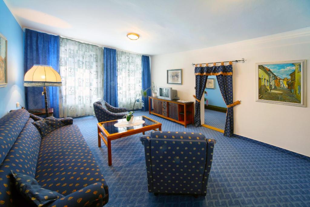 Posezení v ubytování Hotel Solaster Garni