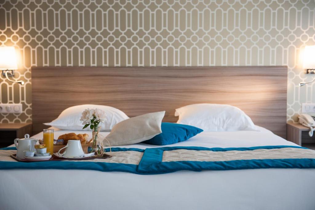 Postel nebo postele na pokoji v ubytování Hotel & Spa Radiana