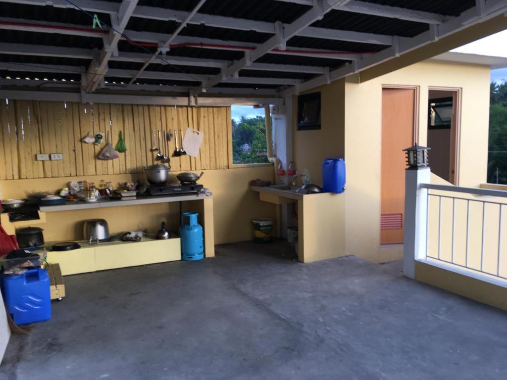 Kuchyň nebo kuchyňský kout v ubytování Mayon Lodging House
