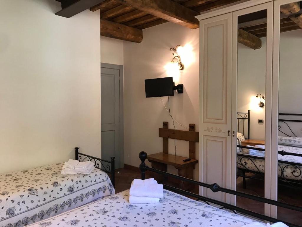 Postel nebo postele na pokoji v ubytování Hotel Panoramico