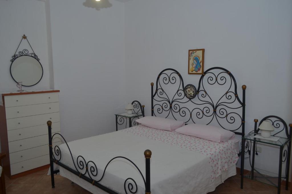 Postel nebo postele na pokoji v ubytování Ansise Guest House