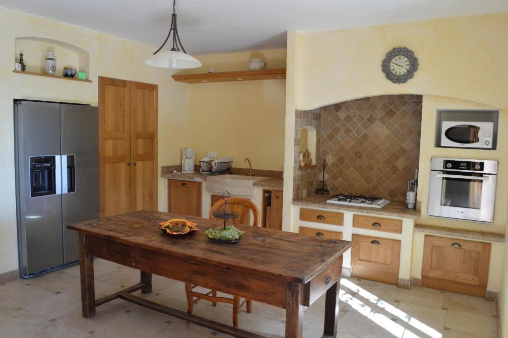 Kuchyň nebo kuchyňský kout v ubytování Ferme de Palumiane - Chambres climatisées