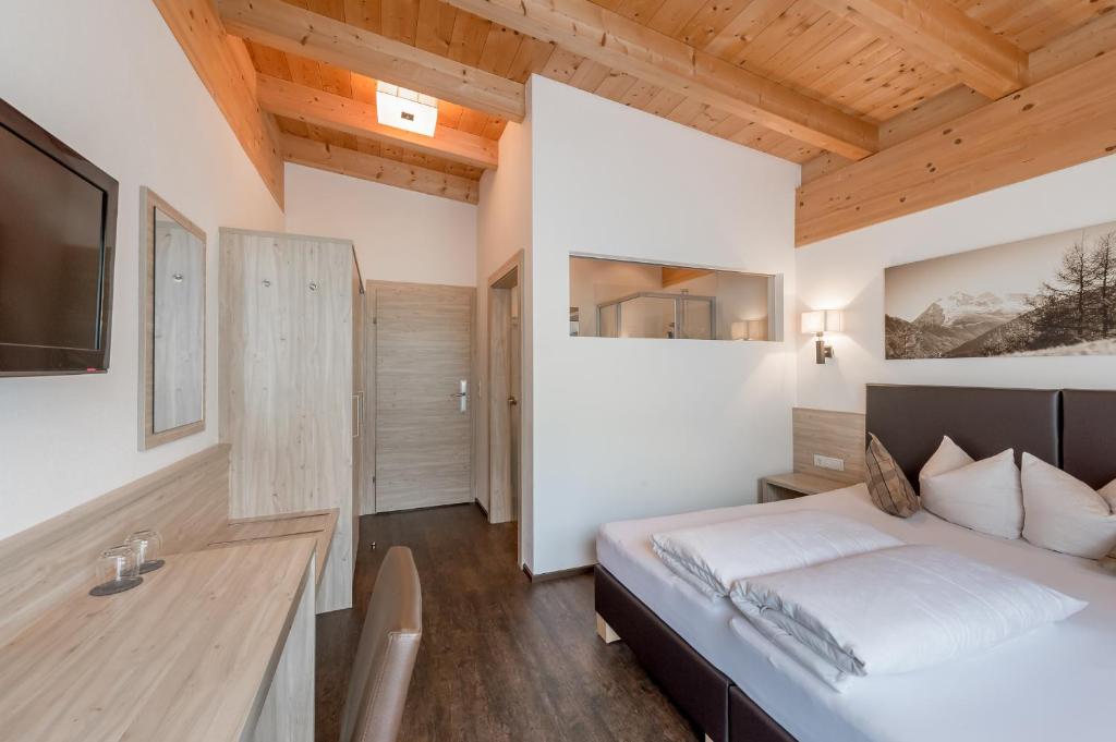 Postel nebo postele na pokoji v ubytování rechenau LIVING & RELAX
