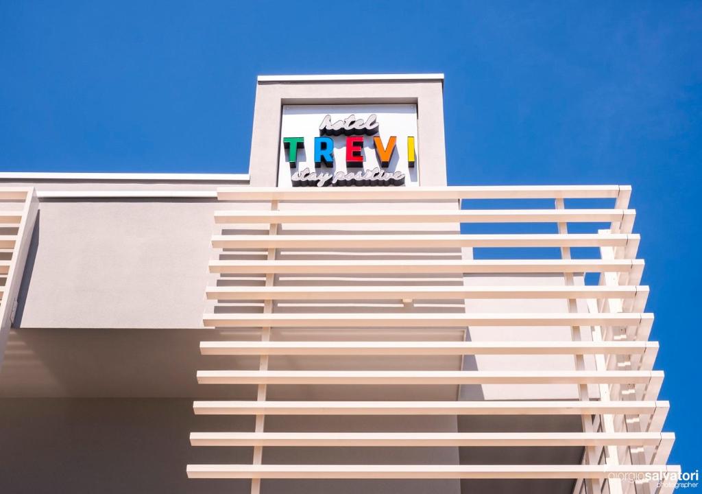 a building with a fedex sign on top of it at Hotel Trevi in Bellaria-Igea Marina