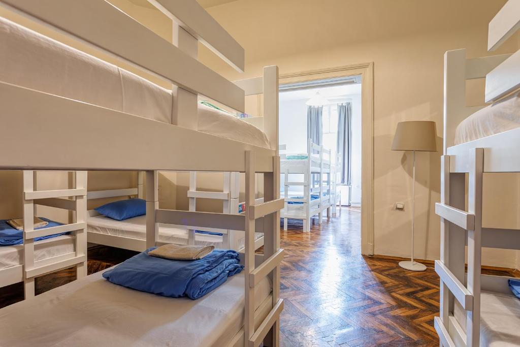 Postel nebo postele na pokoji v ubytování Booking BnB