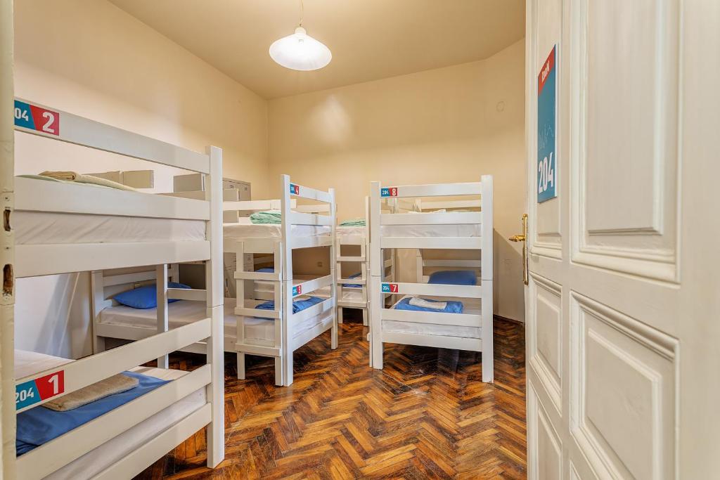 Postel nebo postele na pokoji v ubytování Booking BnB