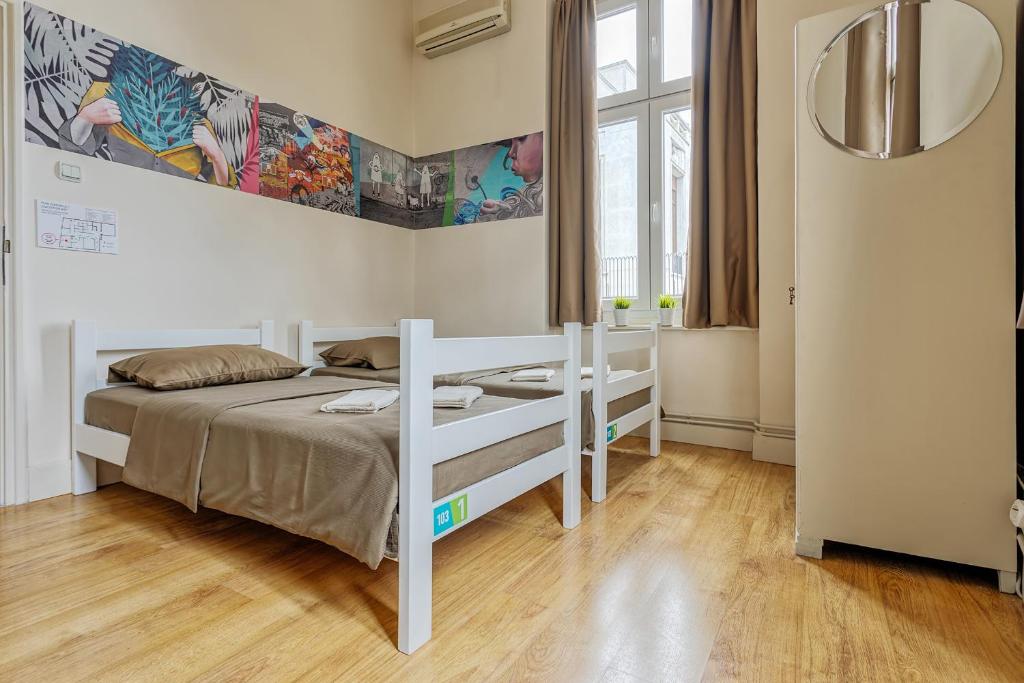 Postel nebo postele na pokoji v ubytování Booking BnB