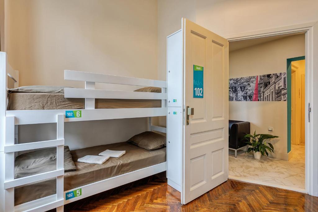Postel nebo postele na pokoji v ubytování Booking BnB