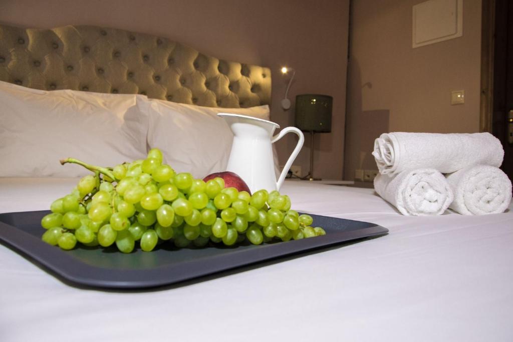 Posteľ alebo postele v izbe v ubytovaní Porta Medina Boutique Hotel