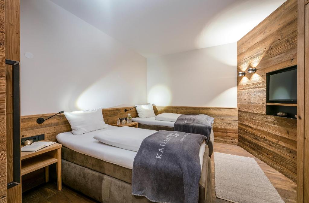 Postel nebo postele na pokoji v ubytování Kaiserlodge