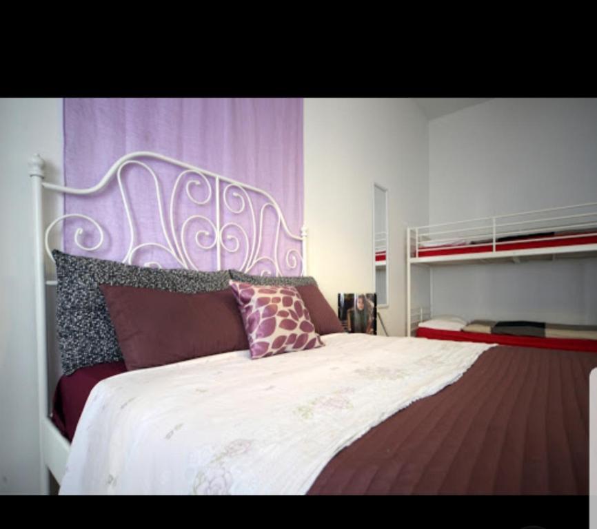 Postel nebo postele na pokoji v ubytování Central Hostel Milano