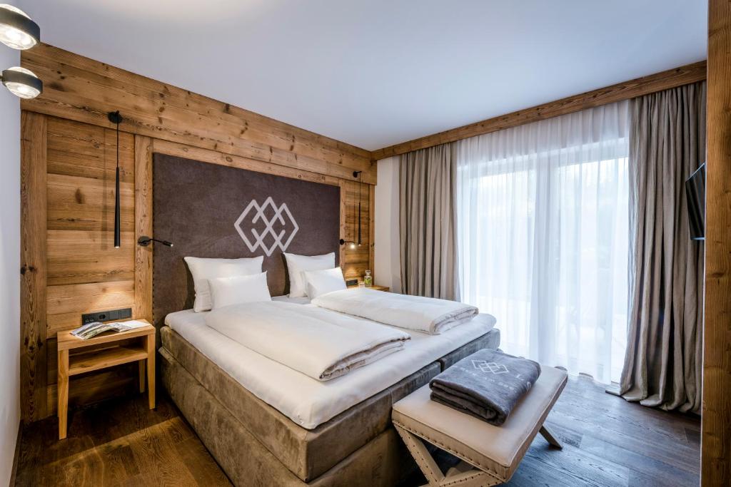 Postel nebo postele na pokoji v ubytování Kaiserlodge