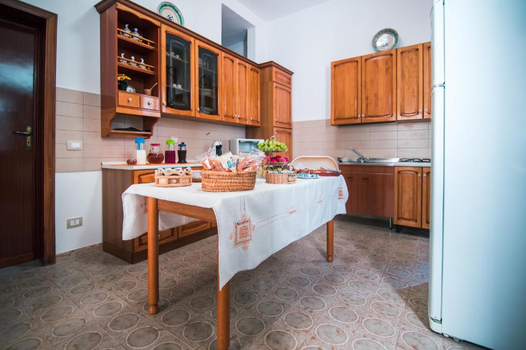 Kuchyňa alebo kuchynka v ubytovaní B&B U PRUFISSURI