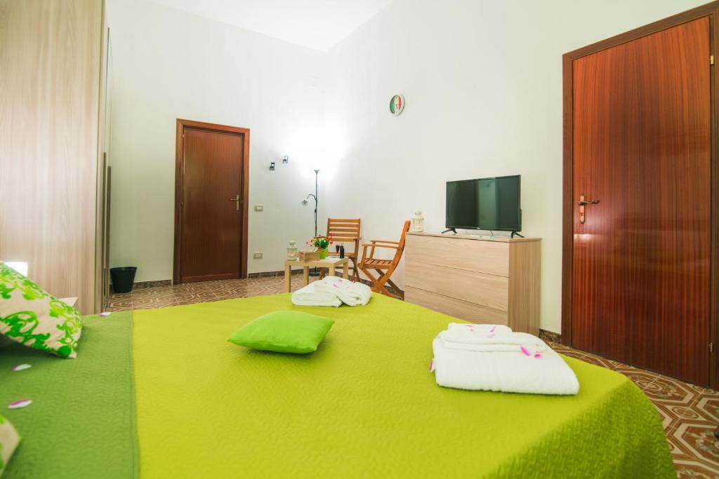 Televízia a/alebo spoločenská miestnosť v ubytovaní B&B U PRUFISSURI