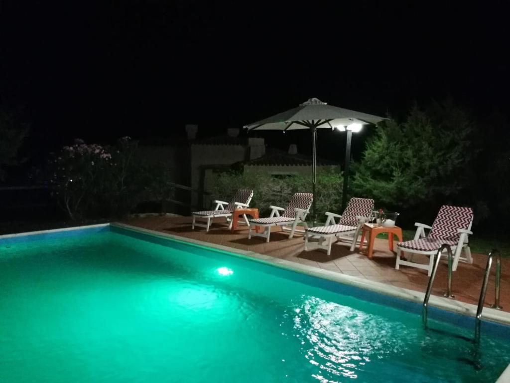 The swimming pool at or close to Villa con Piscina Stintino