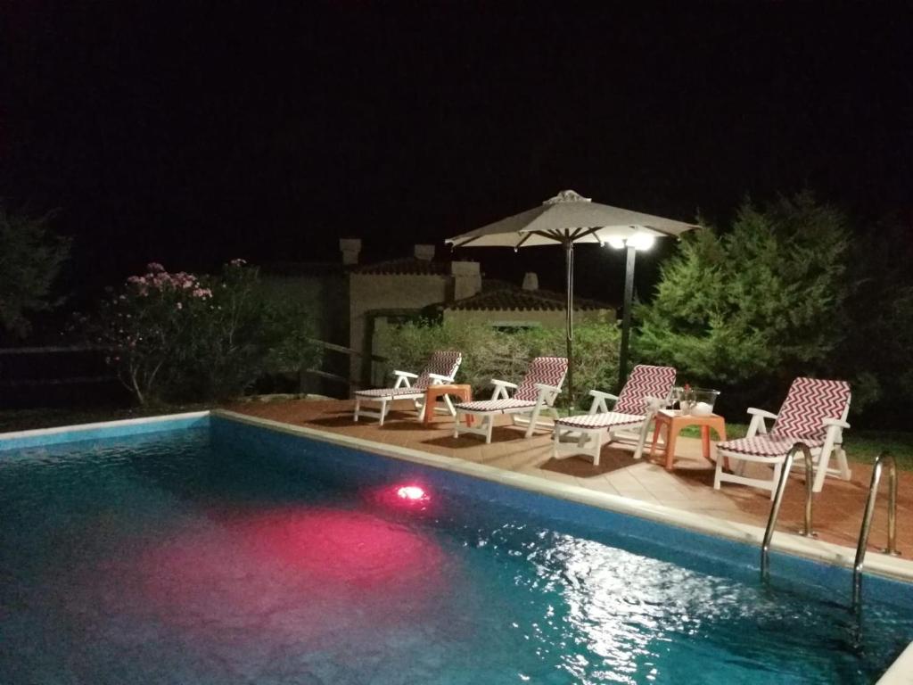 The swimming pool at or close to Villa con Piscina Stintino