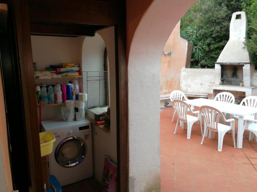 A patio or other outdoor area at Villa con Piscina Stintino