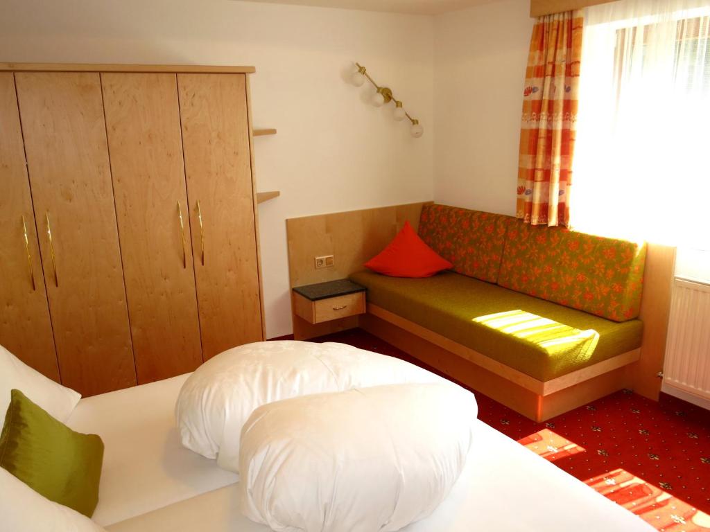 Postel nebo postele na pokoji v ubytování Haus Marita
