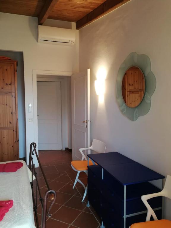 A bed or beds in a room at Villa con Piscina Stintino