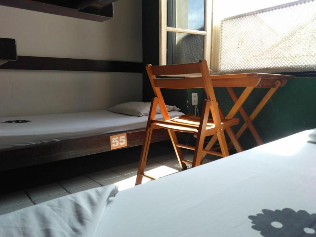 Postel nebo postele na pokoji v ubytování Laranjeiras Hostel