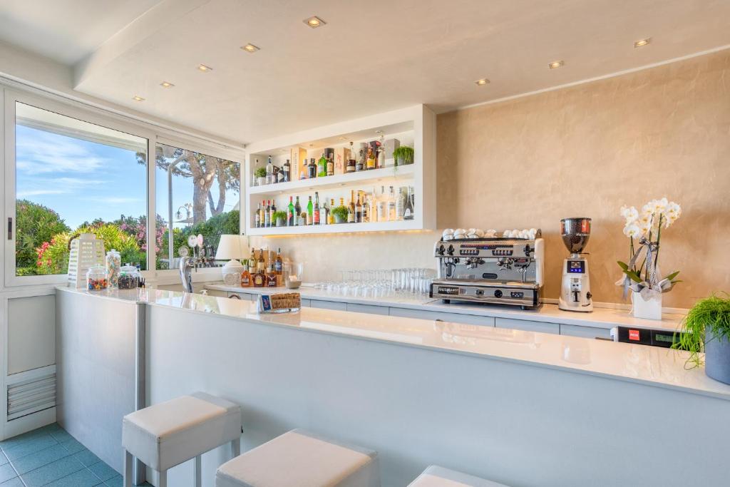 Kuchyň nebo kuchyňský kout v ubytování Hotel Sanremo