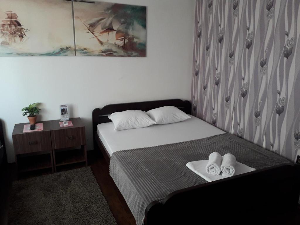 Postel nebo postele na pokoji v ubytování Guest House Vila Salute