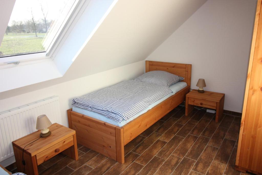Postel nebo postele na pokoji v ubytování Lindenhof-Dangast
