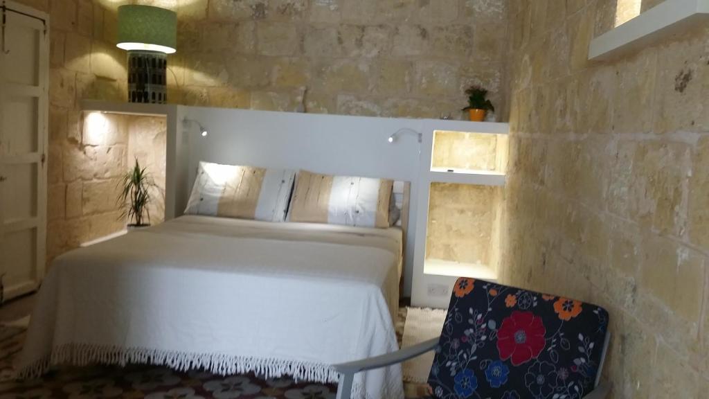 Voodi või voodid majutusasutuse Magic in the Heart of Old Gozo (First Floor) toas