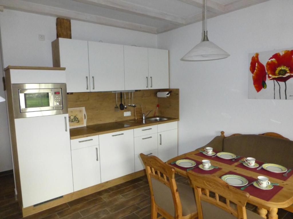 Kuchyň nebo kuchyňský kout v ubytování Lindenhof-Dangast