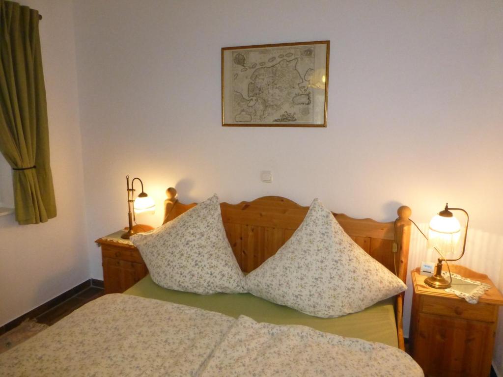 Postel nebo postele na pokoji v ubytování Lindenhof-Dangast