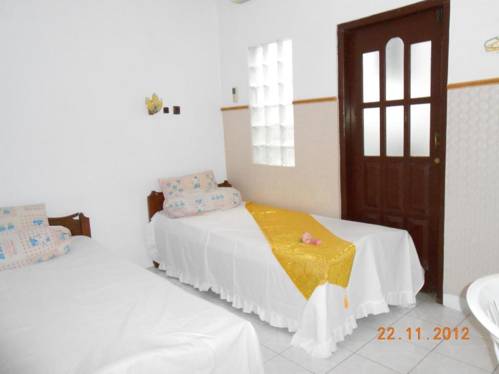 Postel nebo postele na pokoji v ubytování Fortuna Guest House