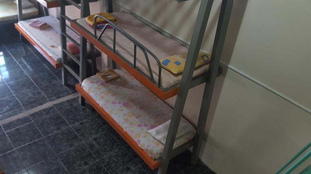 Postel nebo postele na pokoji v ubytování Hospedaje Dannita B&B