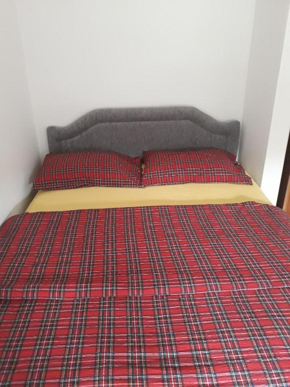 Postel nebo postele na pokoji v ubytování Apartment Holiday