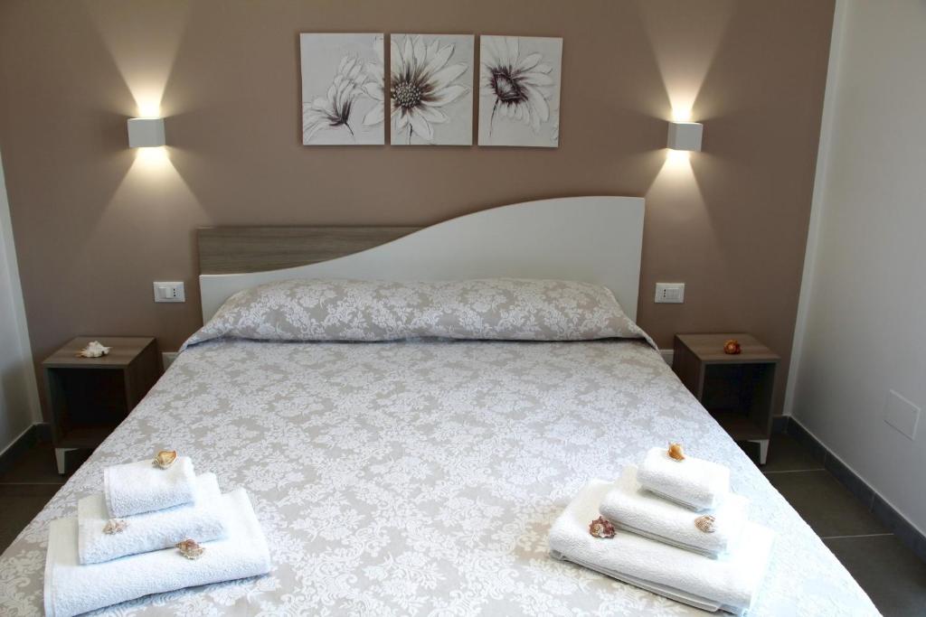 Postel nebo postele na pokoji v ubytování Casa Catalano