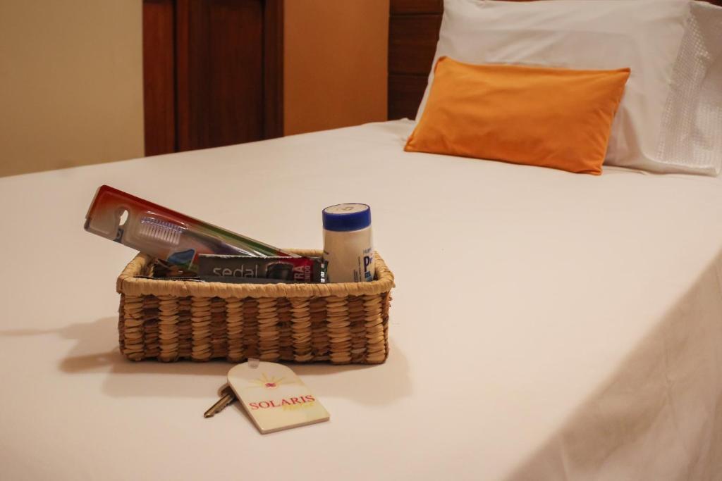 Postel nebo postele na pokoji v ubytování Hotel Solaris