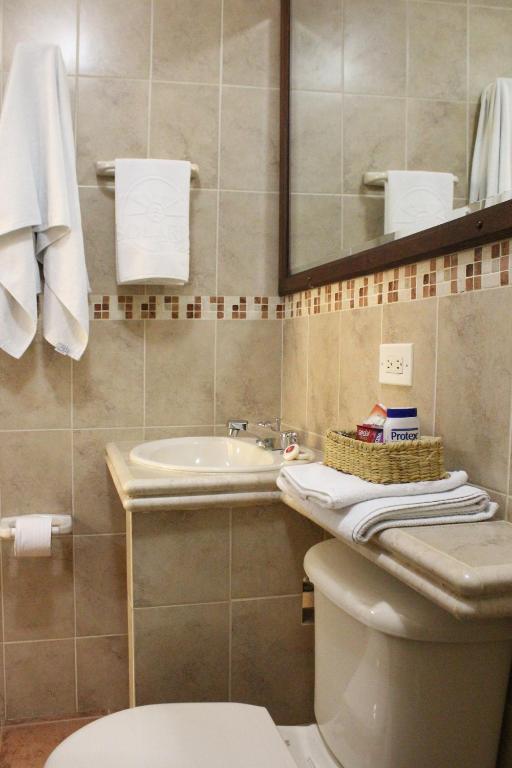 Koupelna v ubytování Hotel Solaris