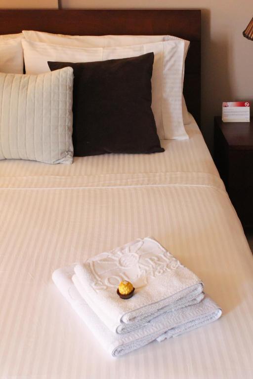 Postel nebo postele na pokoji v ubytování Hotel Solaris