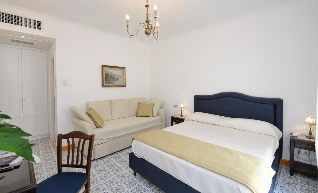 Postel nebo postele na pokoji v ubytování Residenza Luce