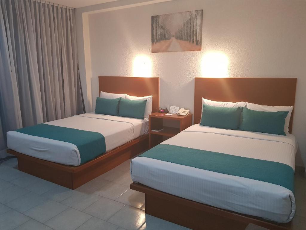 Postel nebo postele na pokoji v ubytování Best Western Global Express