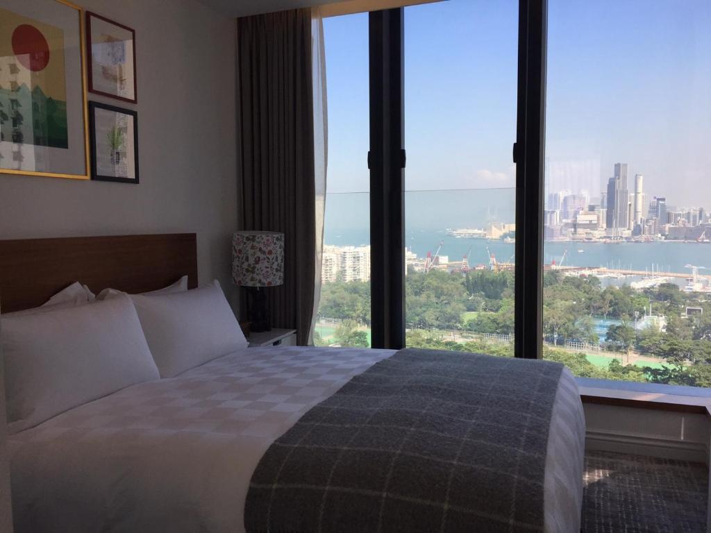 Little Tai Hang 酒店及服务式公寓客房内的一张或多张床位