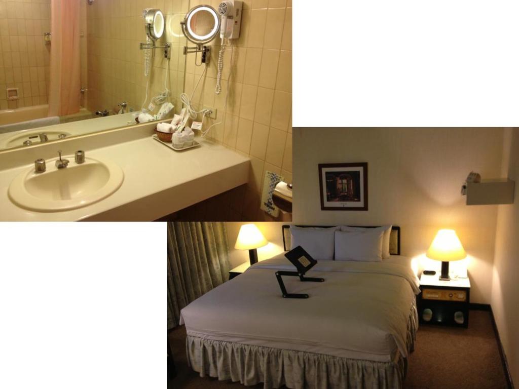 a hotel room with a bed and a sink at The Premier Hotel in Tainan