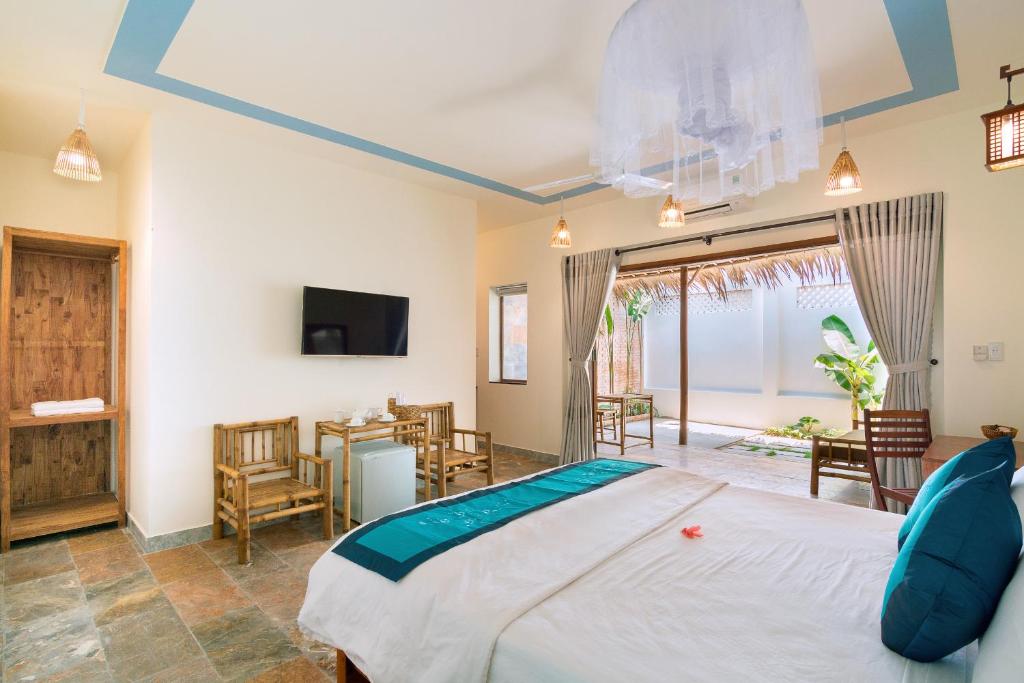 Postel nebo postele na pokoji v ubytování Seamist Ocean Villa