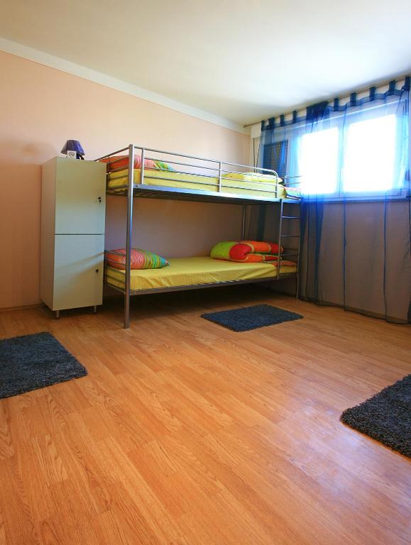 Postel nebo postele na pokoji v ubytování Backpackers Fairytale Hostel