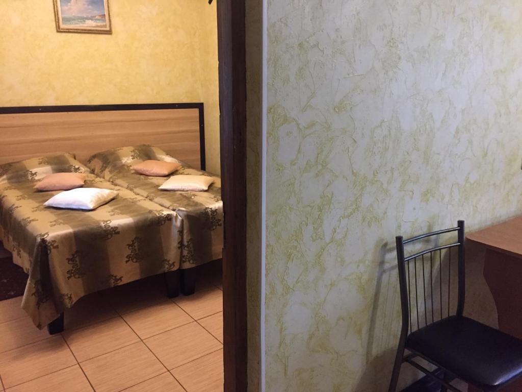 Postel nebo postele na pokoji v ubytování Kazka